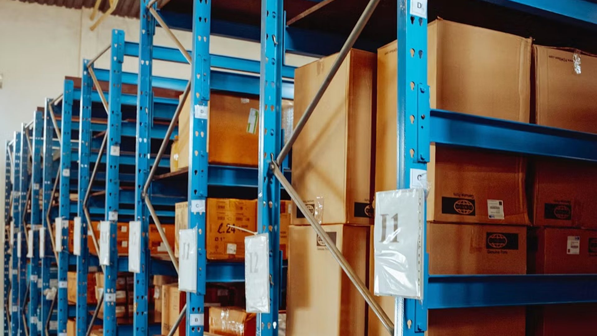 Shelves of boxed inventory in a warehouse